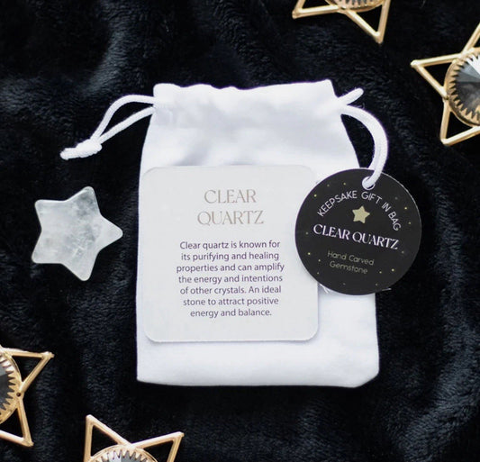 Clear quartz star in velvet bag