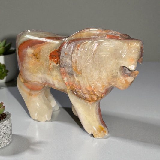 Banded calcite (onyx) lion