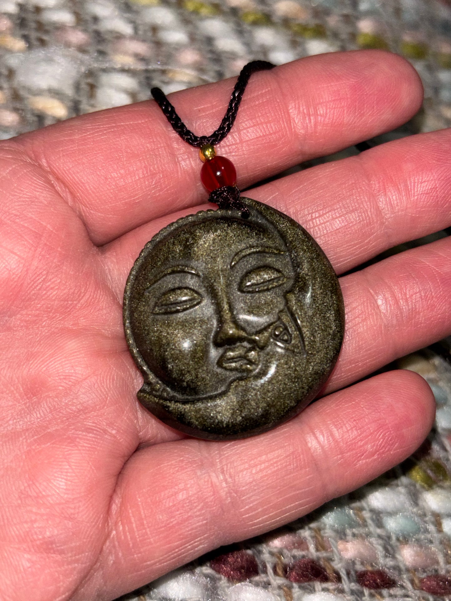 Golden sheen obsidian sun moon face pendant